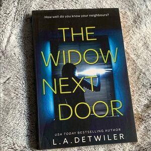 The Widow Next Door Book by L.A. Detwiler